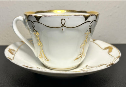 Late 19th Century French Rococo Revival T. REES. Porcelain Gilded Floral/Vine Motifs Teacup and Saucer Set