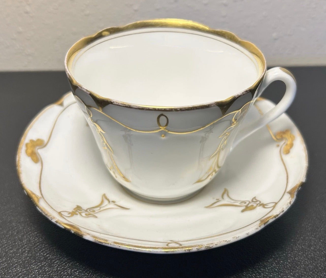 Late 19th Century French Rococo Revival T. REES. Porcelain Gilded Floral/Vine Motifs Teacup and Saucer Set
