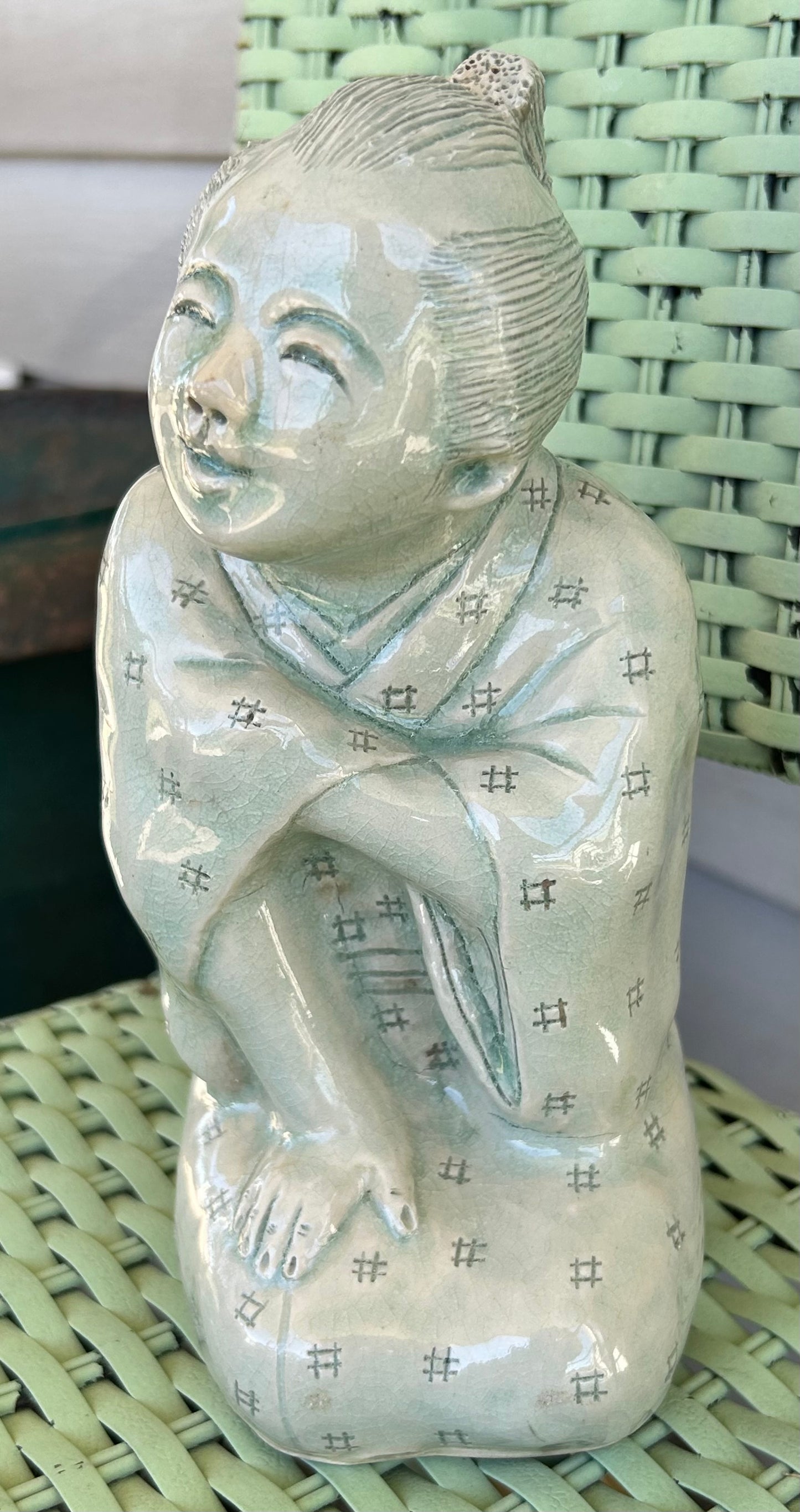 Vintage Mid 20th Century Japanese Young Boy Kneeling Carved Crackle Glazed Celadon Ceramic Sculptural Figure (Showa Period)