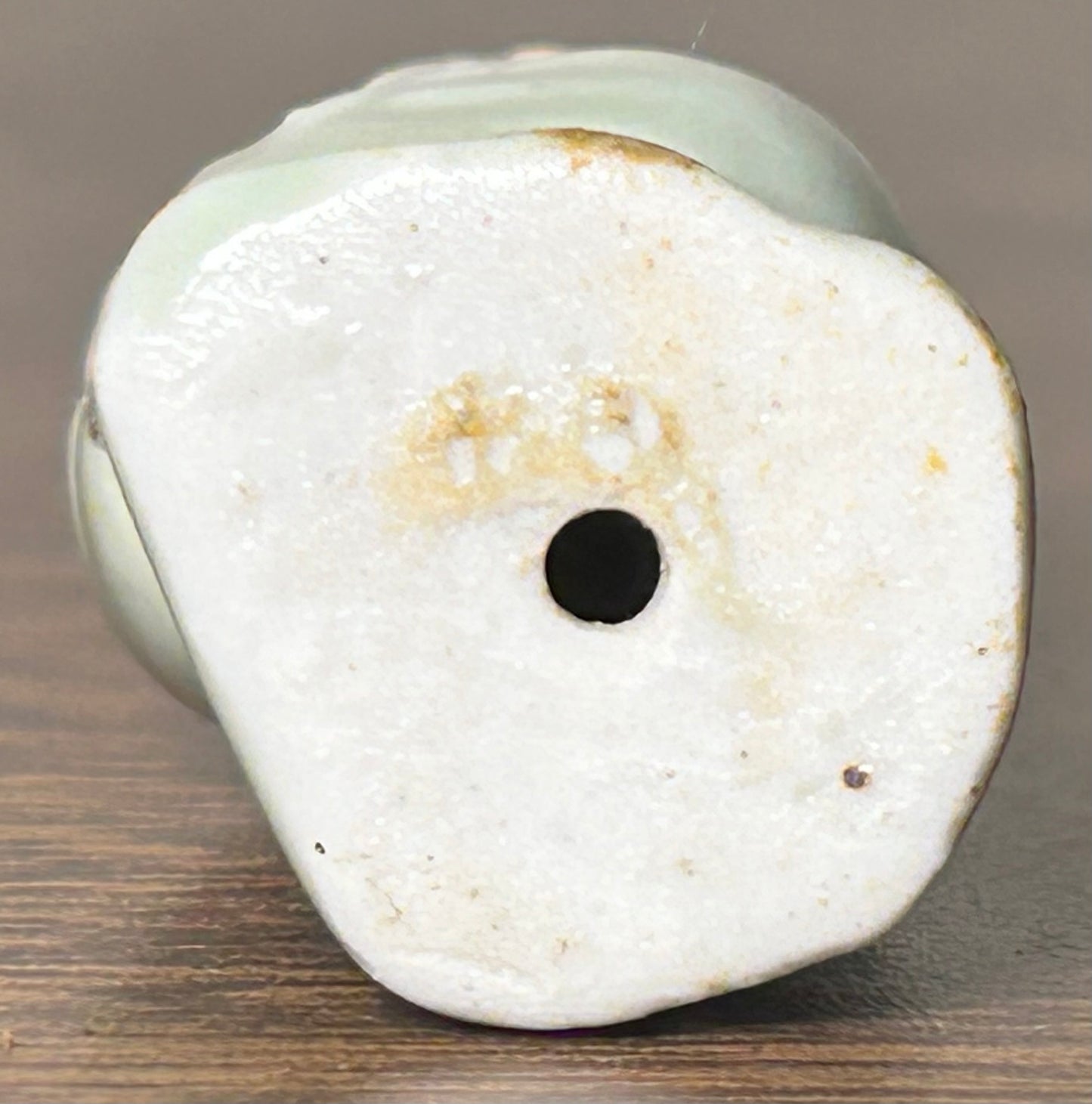 Circa Mid 19th Century Japanese Celadon Glazed Porcelain Fukurokuju Miniature Netsuke Figurine