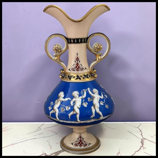 Mid 19th Century French Rococo Revival Porcelain Hand-Painted Gilded Bacchanal Putti Holding Vine Motif Double-Handled Footed Baluster Vase