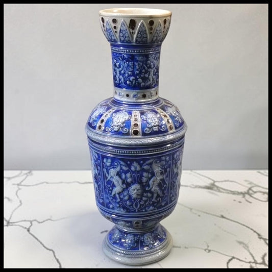 Late 19th Century German Renaissance Revival Westerwald Salt Glazed Stoneware Green Man/Cherubs/Mythical Figure Motifs Footed Rouleau Vase