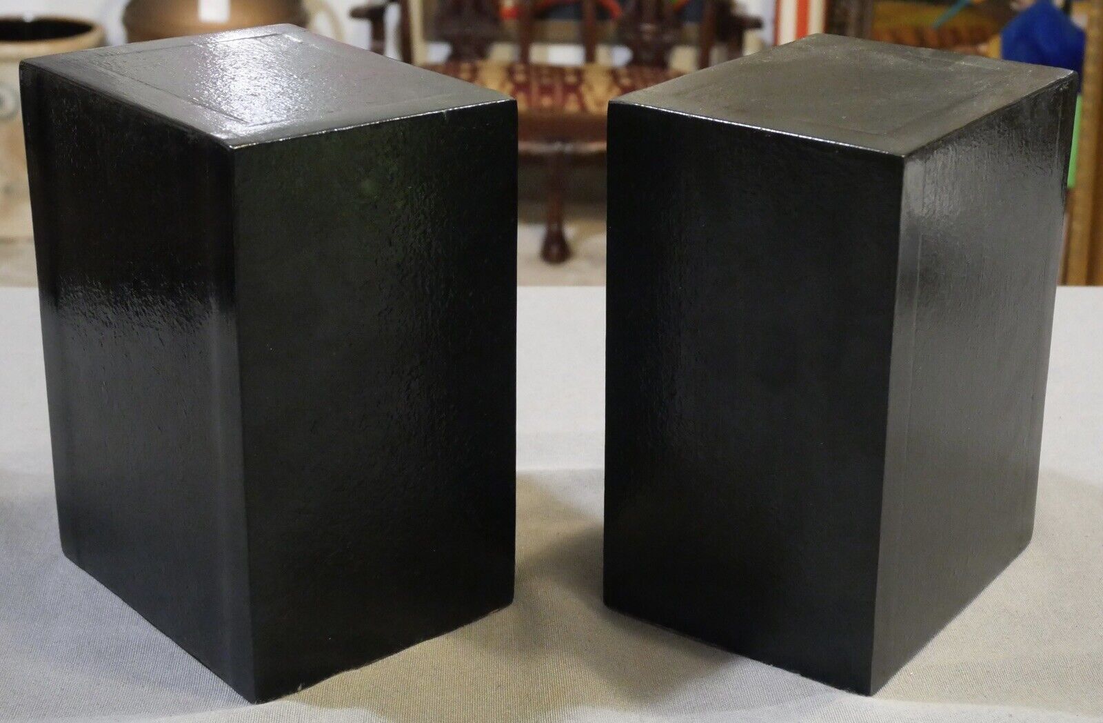 Pair of Mid 20th Century Pre-Columbian Toloma Anthropomorphic Motif Leather Covered Weighted Bookends